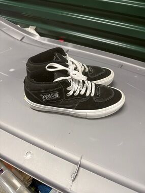 Vans Black and White Mid-Top Sneakers